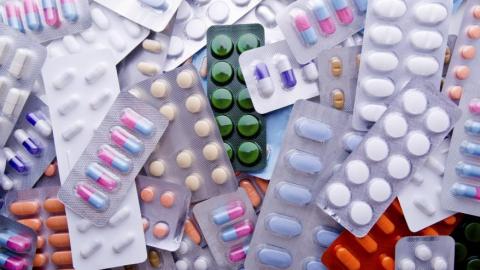 Stack of various prescription medications
