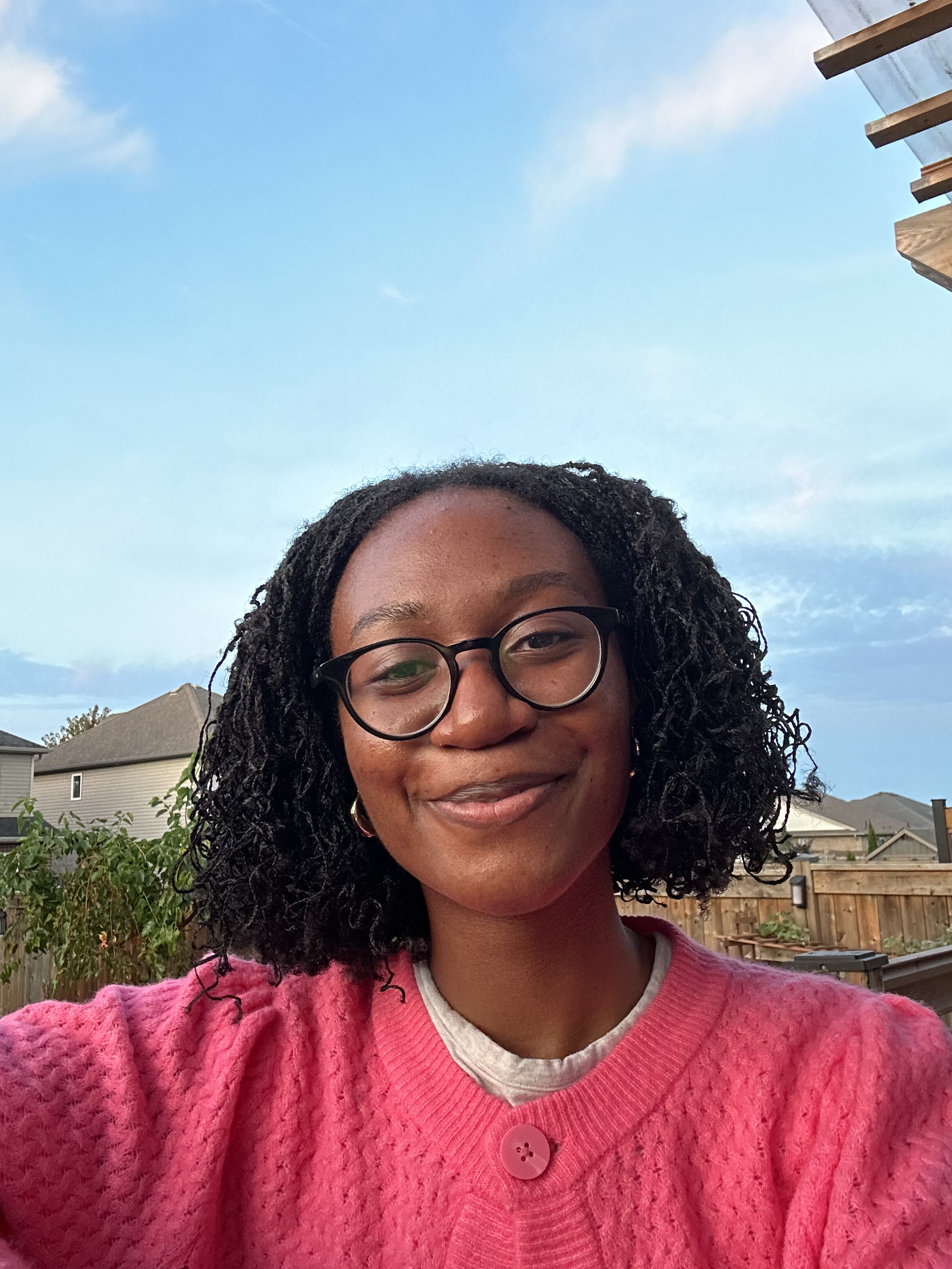 Jada self-portrait outside her home